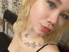 Solmar - blond female with  small tits webcam at xLoveCam