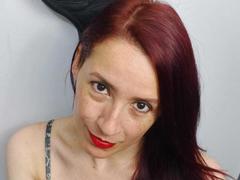 SweettEve - female with red hair and  big tits webcam at xLoveCam