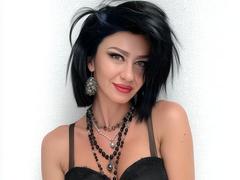 Taissa69 - female with black hair and  big tits webcam at xLoveCam