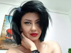 Taissa69 - female with black hair and  big tits webcam at xLoveCam