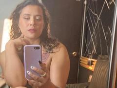 Tamarajoones - female with black hair and  big tits webcam at xLoveCam