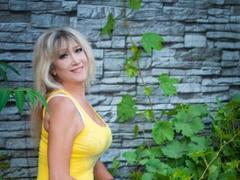 TastyCarmen - female with brown hair and  big tits webcam at xLoveCam