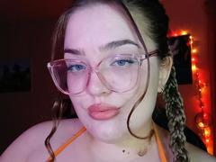 TeasingXDora - female with brown hair and  big tits webcam at xLoveCam