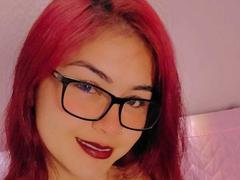 Thalassa - female with red hair and  big tits webcam at xLoveCam