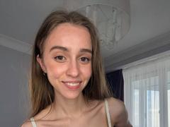ThersaGarelik - female with brown hair and  big tits webcam at xLoveCam