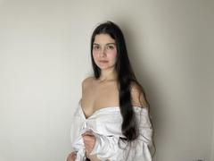 Tisia - female with brown hair and  small tits webcam at xLoveCam