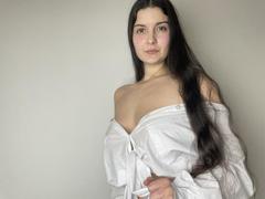 Tisia - female with brown hair and  small tits webcam at xLoveCam
