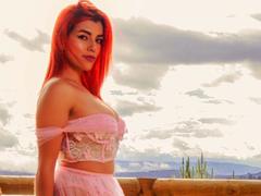 ZoeeLove - female with red hair and  big tits webcam at ImLive