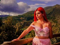 ZoeeLove - female with red hair and  big tits webcam at ImLive